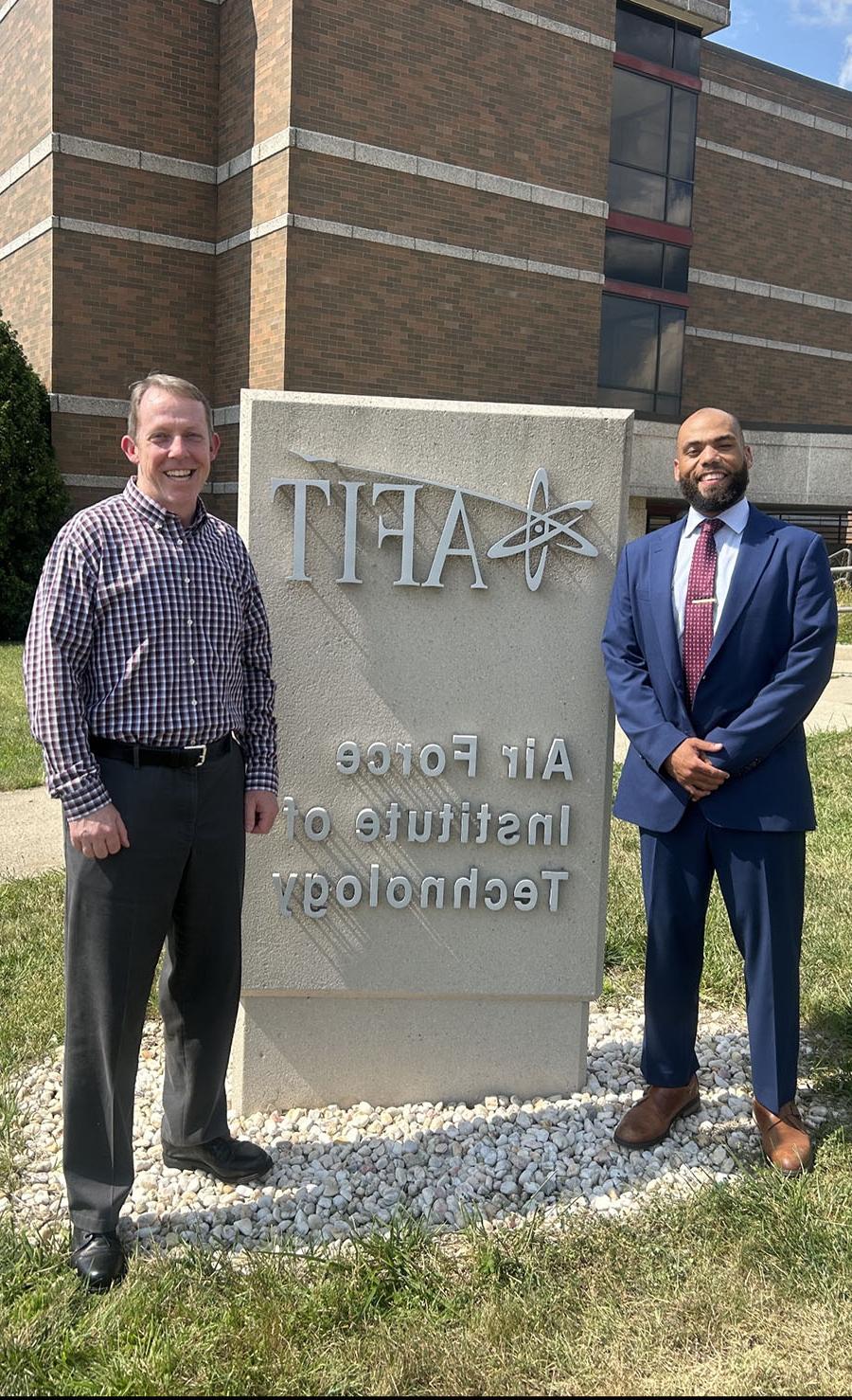 Carson Long (left) is pictured with his doctoral advisor, Dr. Brian Lunday, outside the Air Force Institute of Technology after defending his dissertation last August.